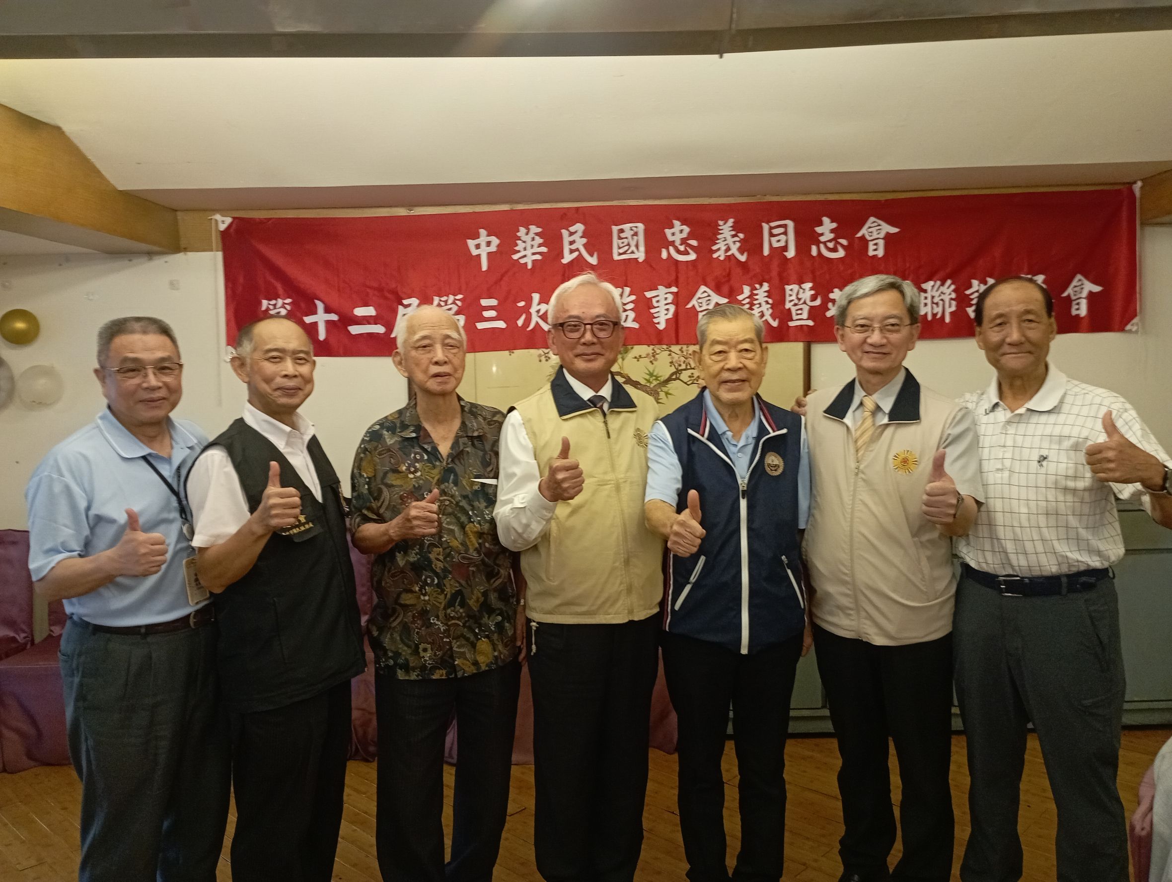 陳主委(圖左四)與忠義同志會理事長(圖右三)合影